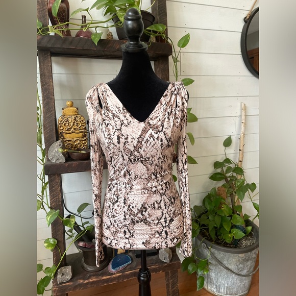 Jennifer Lopez: Brown and White Animal Print Cold Shoulder Blouse - Picture 15 of 17